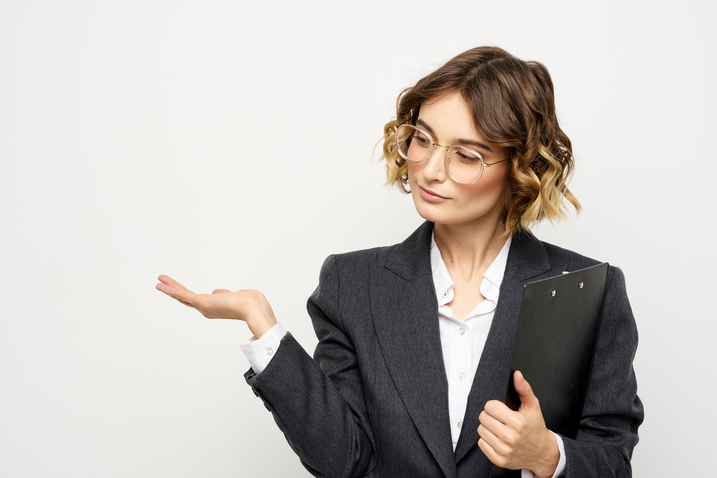 Woman in Business Suit Finances Work Documents Glasses Hairstyle